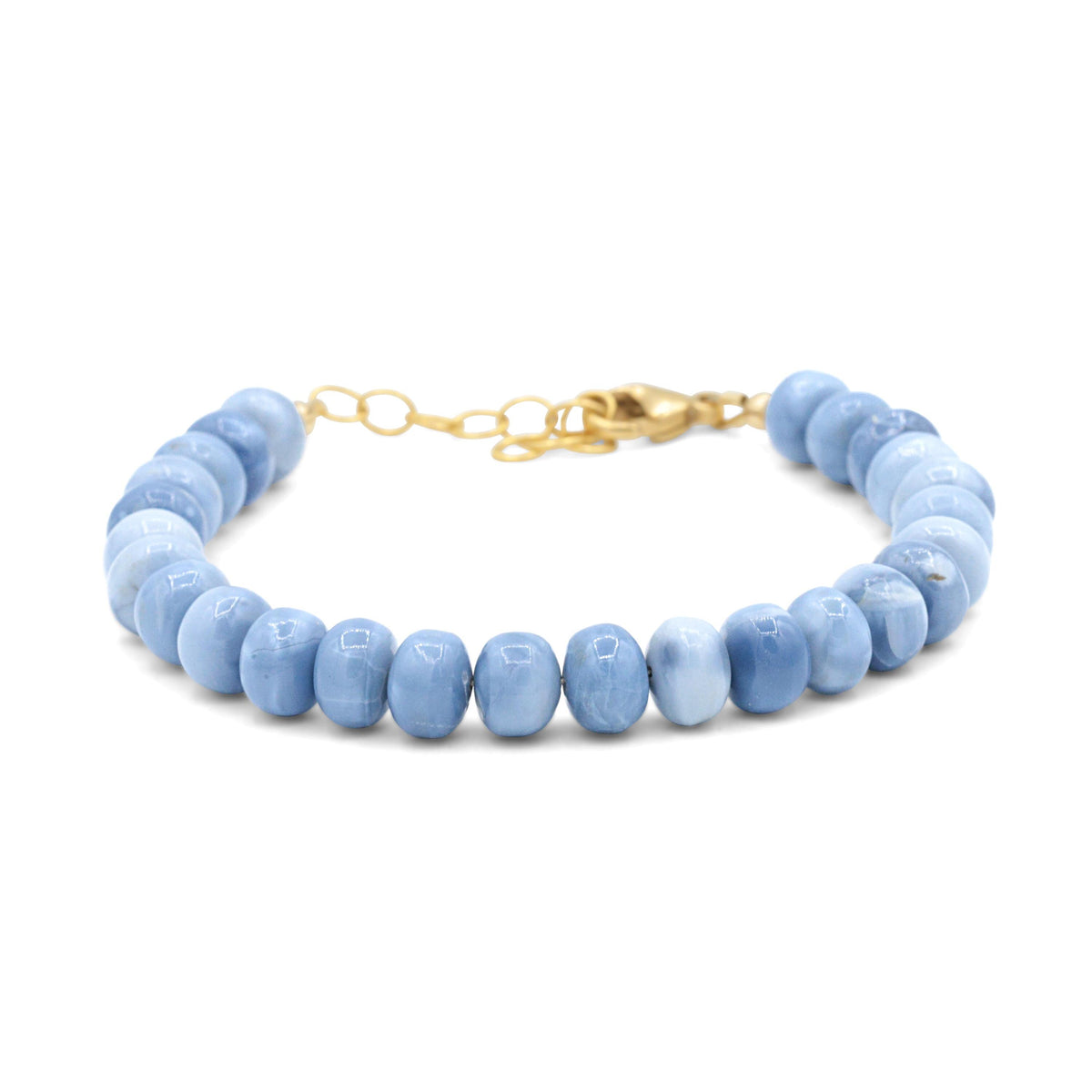Blue Opal bracelet by Earthly Abundance featuring polished blue opal beads on a secure elastic band.