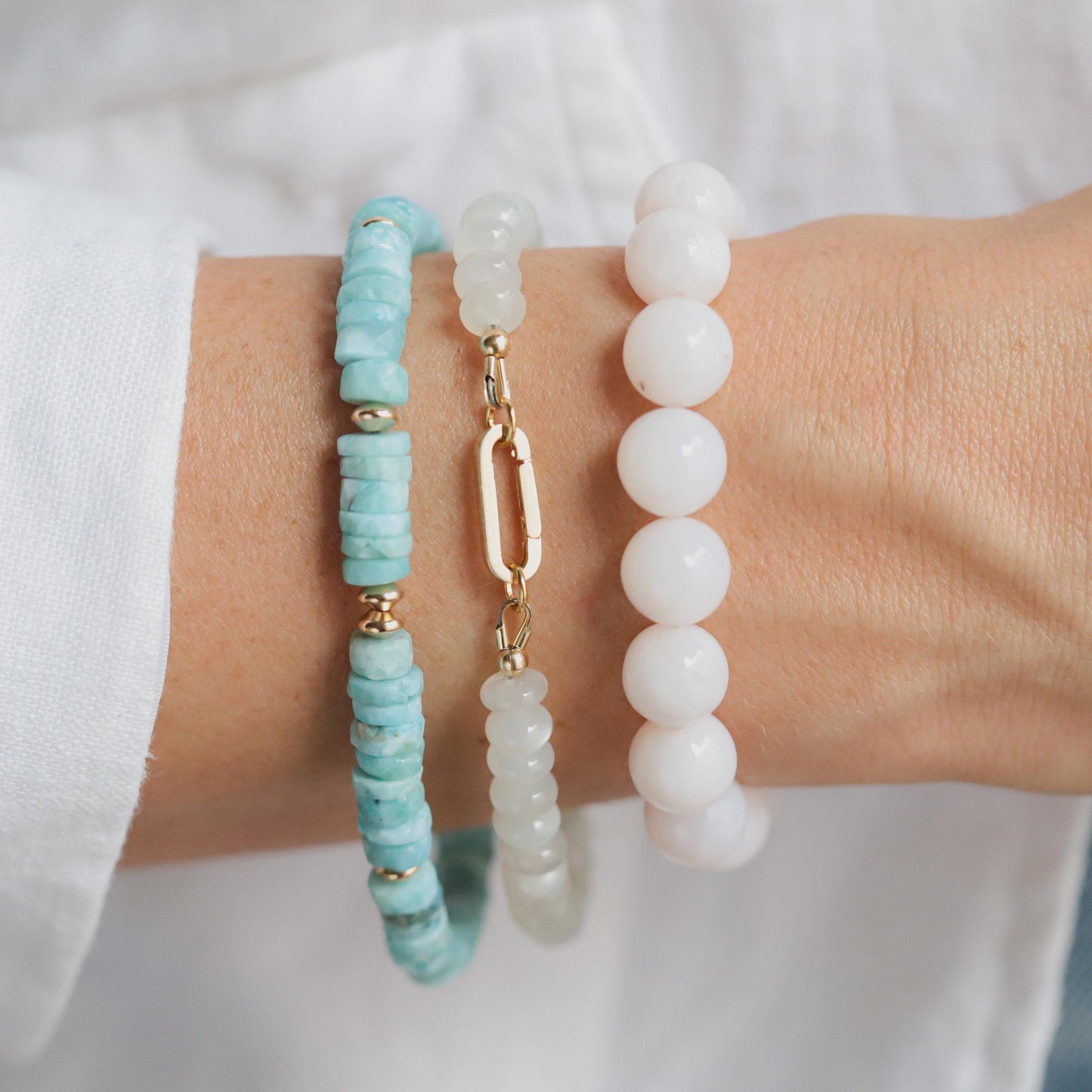 Larimar Heishi bracelet with 14K gold-filled accents, featuring smooth blue gemstone beads, from Earthly Abundance.