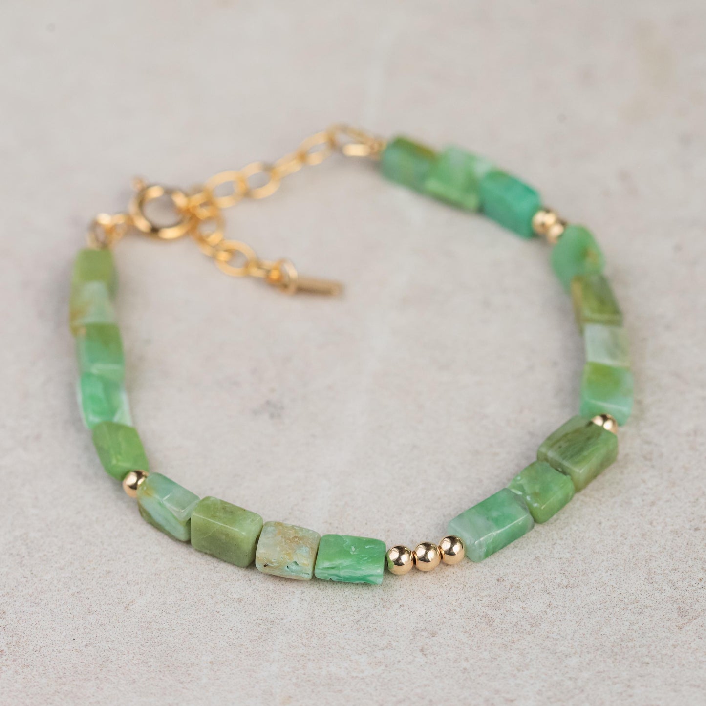 Square cut Peruvian Opal bracelet with 14K gold-filled links from Earthly Abundance, featuring polished opal stones.
