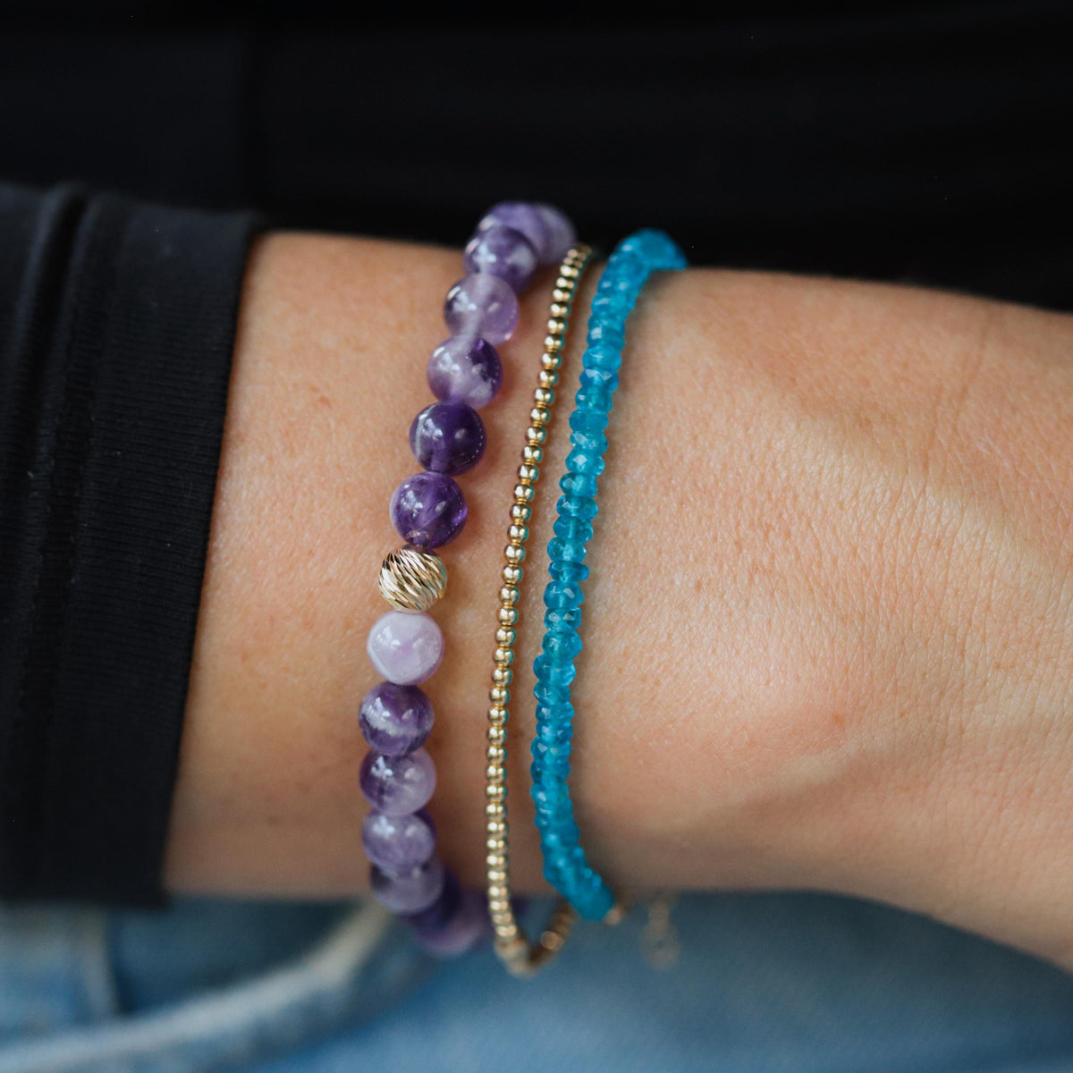 Apatite bracelet featuring 14K gold accents from Earthly Abundance, showcasing vibrant blue-green gemstone beads on a delicate chain.
