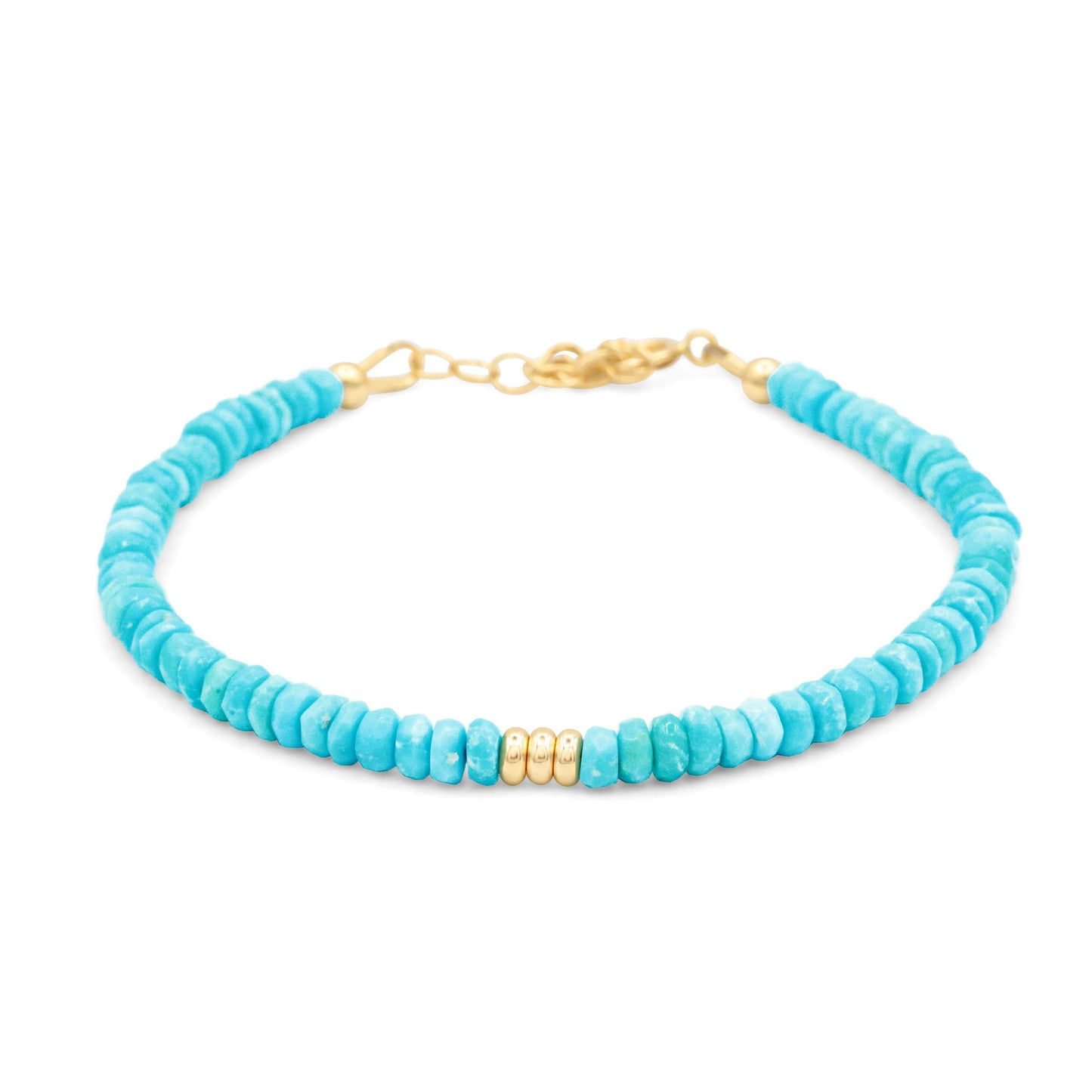 Sleeping Beauty turquoise bracelet with 14K gold setting, featuring vibrant blue turquoise stones and elegant design by Earthly Abundance.