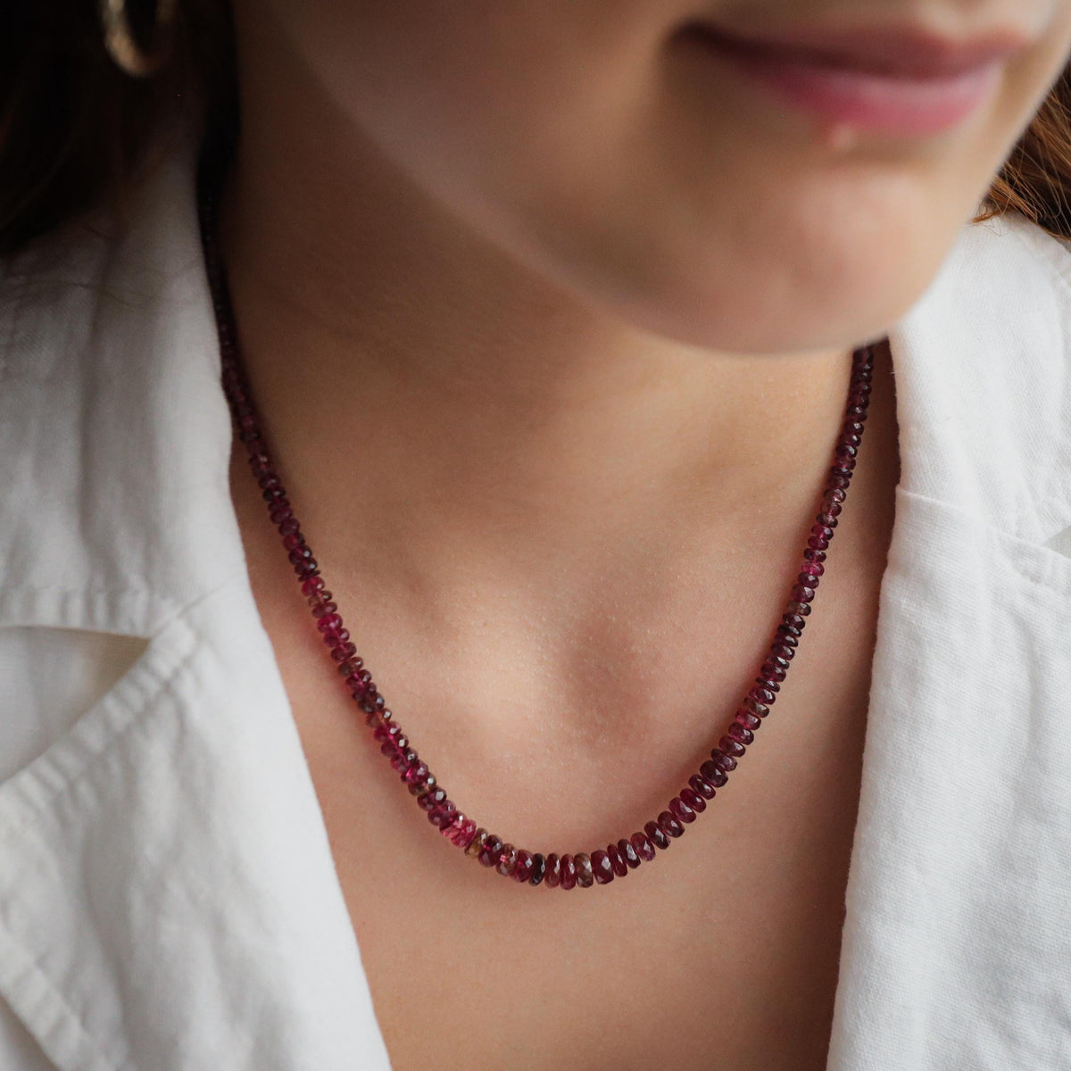 Rosé Ember Pink Tourmaline Necklace in 14K gold from Earthly Abundance, featuring a vibrant pink gemstone pendant.
