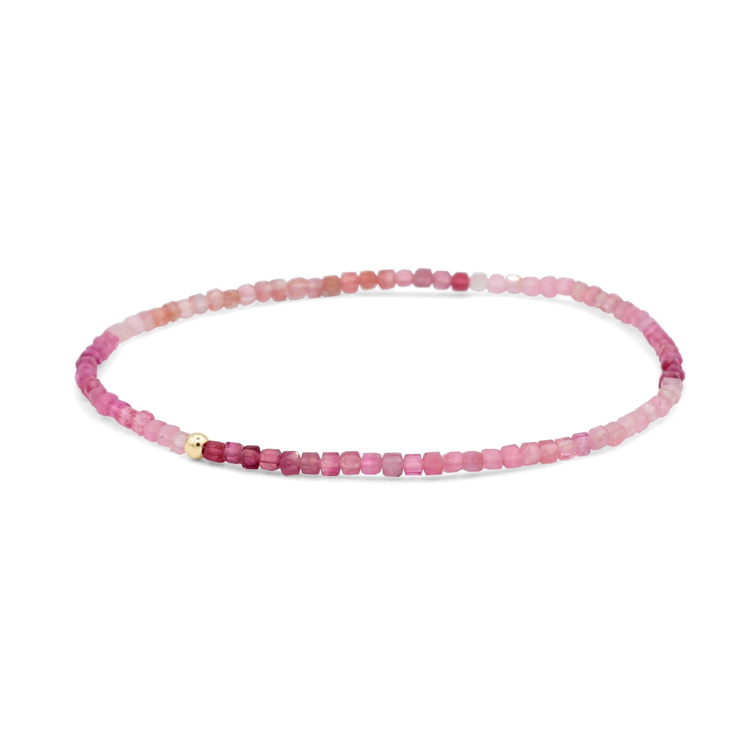 Pink tourmaline cube bracelet with 14K gold accents from Earthly Abundance, featuring faceted pink stones on a delicate chain.