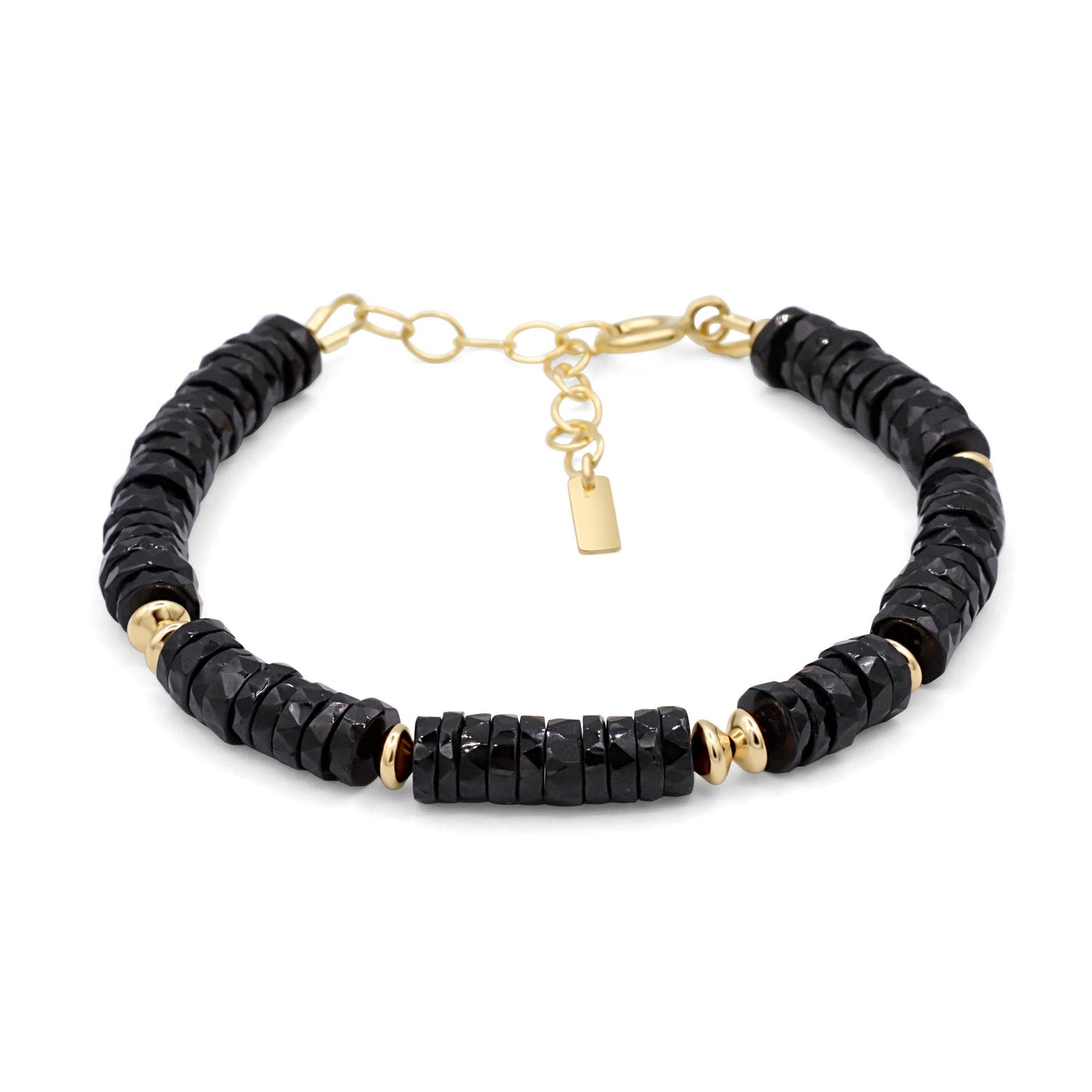 Black Tourmaline Heishi bracelet by Earthly Abundance featuring small, round black gemstone beads on a stretchy band.