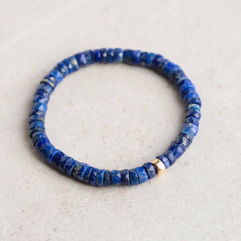 Wholesale Lapis Lazuli Heishi beads from Earthly Abundance Jewelry, showcasing vibrant blue gemstone strands.