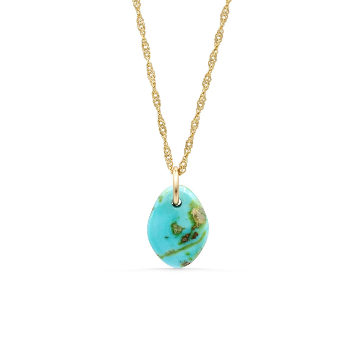 Turquoise necklace with silver accents from Earthly Abundance, showcasing vibrant turquoise stones and detailed craftsmanship.