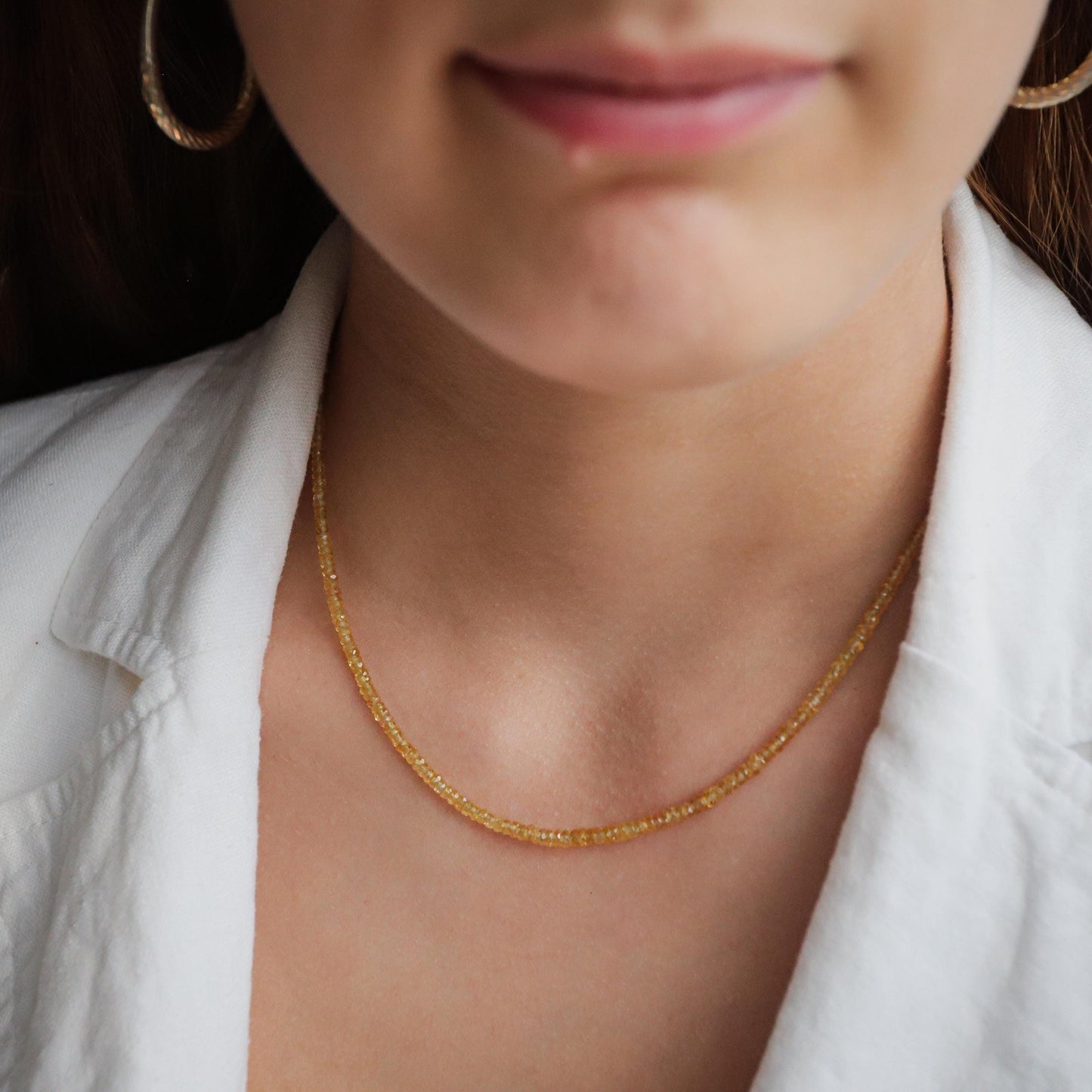 Yellow sapphire necklace in 14K gold featuring a vibrant yellow sapphire pendant, elegant jewelry piece by Earthly Abundance.