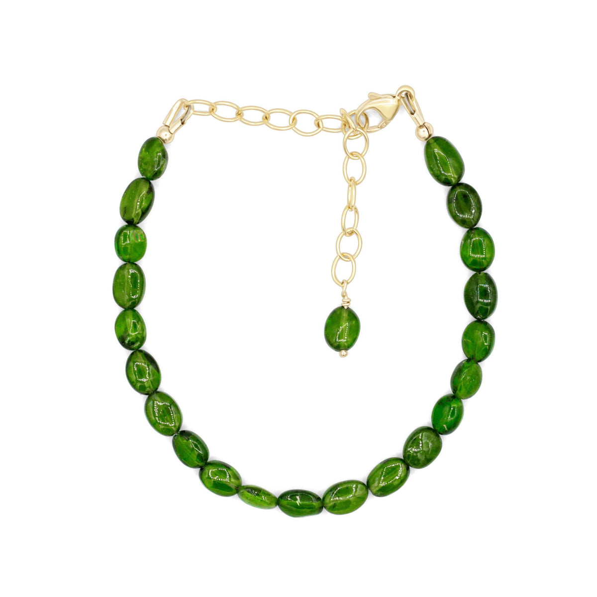 Oval chrome diopside bracelet with silver-tone clasp, featuring vibrant green gemstones from Earthly Abundance.