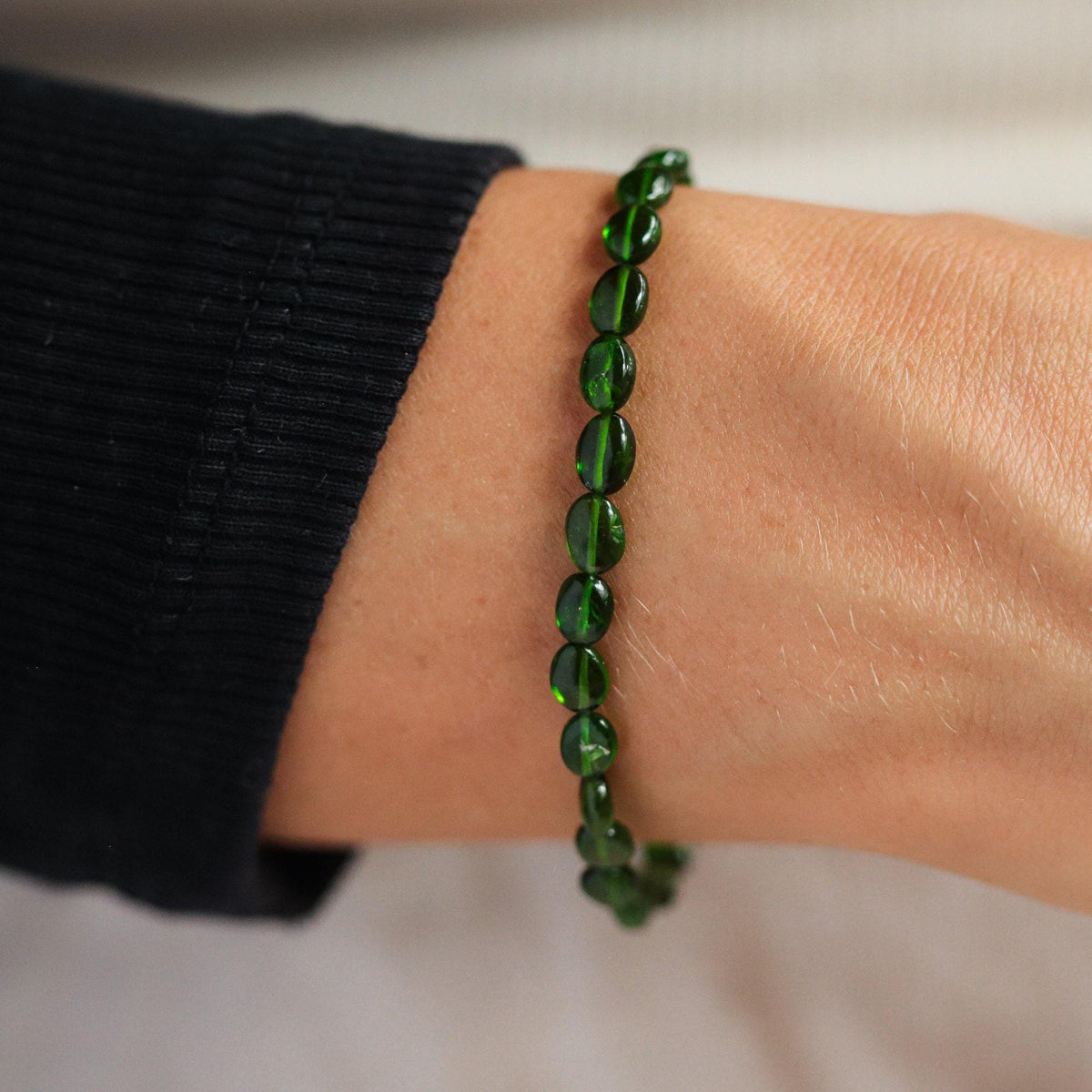 Oval Chrome Diopside bracelet featuring a polished green gemstone design by Earthly Abundance.