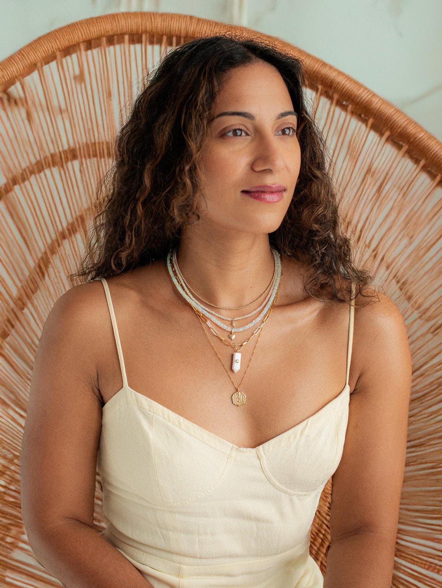 Ethiopian Opal North Star Necklace in 14K gold with a sparkling opal star pendant, elegant jewelry piece.
