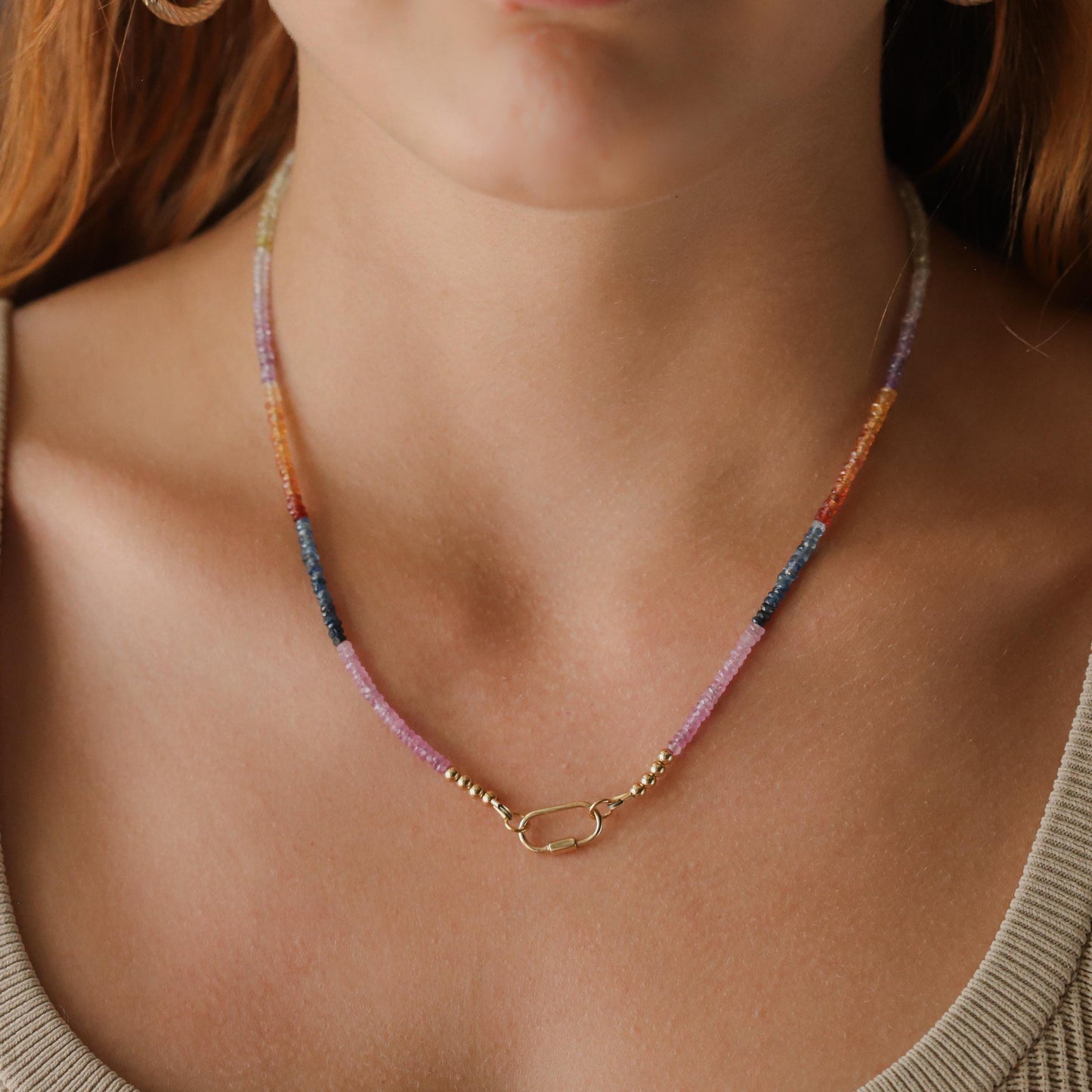 Multi sapphire carabiner necklace by Earthly Abundance featuring colorful gemstone charms on a silver chain.