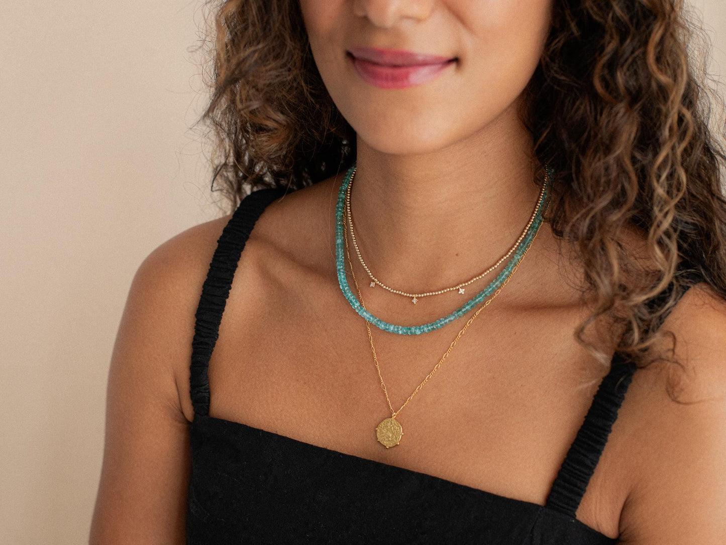 Aapatite bi-color necklace with 14K gold chain showcasing vibrant blue and green apatite gemstones.