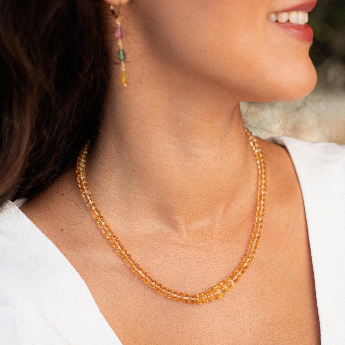 Citrine Honey Glow necklace by Earthly Abundance featuring a warm, golden gemstone pendant on a delicate chain.