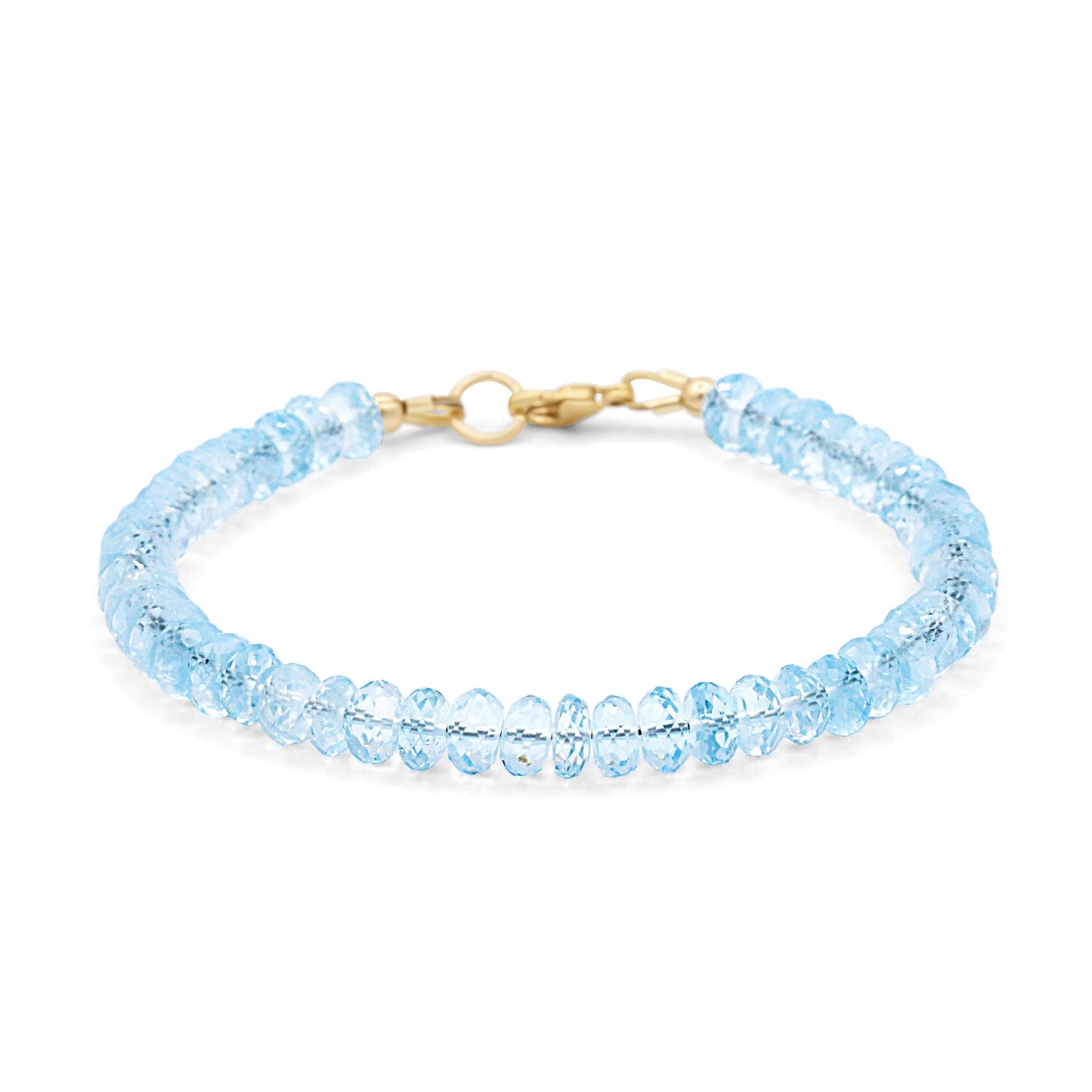Swiss Blue Topaz bracelet in 14K gold with sparkling blue gemstones, featuring a delicate and elegant design.