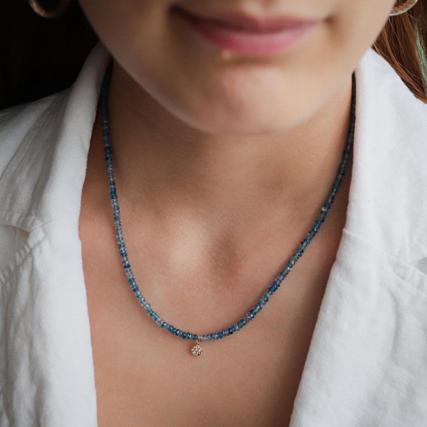 Elegant Santa Maria aquamarine diamond necklace from Earthly Abundance featuring a sparkling aquamarine pendant and delicate chain.