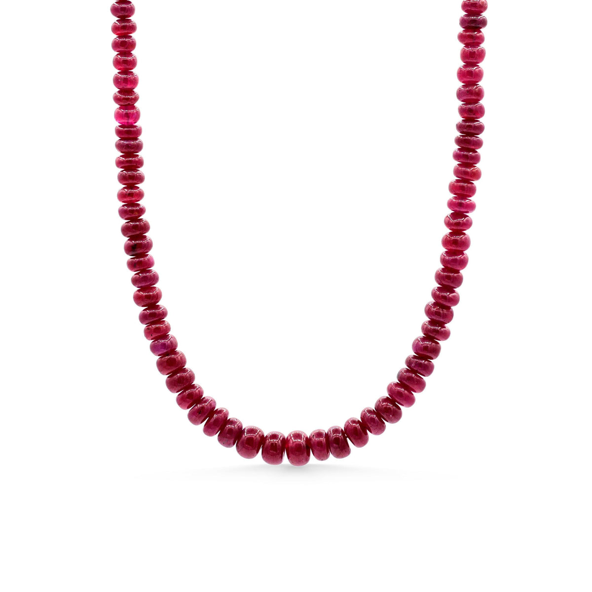 14K Crown Longido Ruby Necklace by Earthly Abundance featuring a vibrant red ruby pendant on a gold chain.