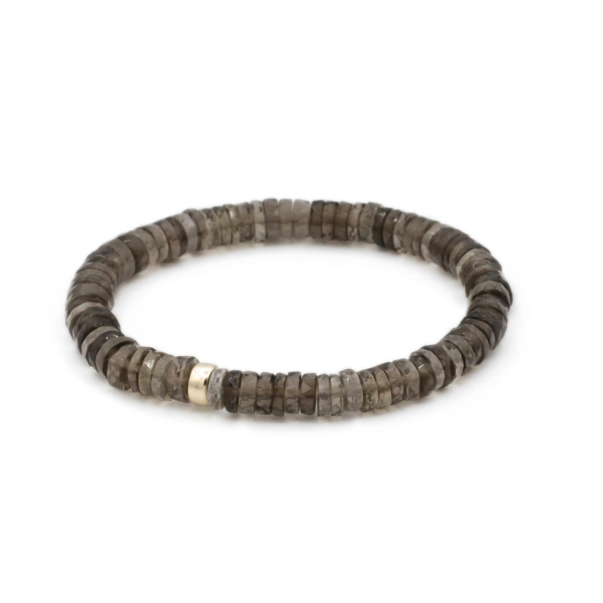 Smoky Quartz Heishi bracelet featuring smooth, cylindrical beads in a natural earthy tone, styled on a delicate elastic band.