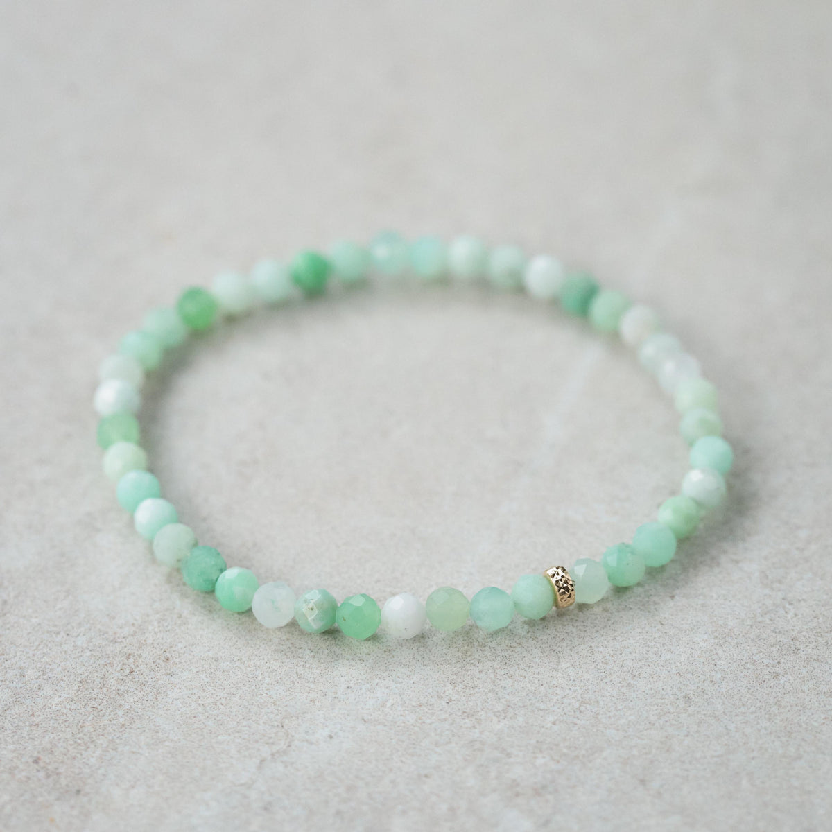 Chrysoprase bracelet with 14K gold accents from Earthly Abundance, featuring polished green gemstone beads on a delicate chain.