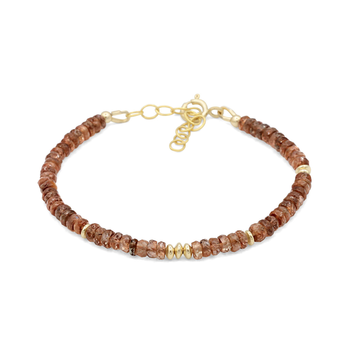 Earthly Abundance Andalusite bracelet featuring polished gemstone beads on a stretch cord, showcasing vibrant green and purple hues.