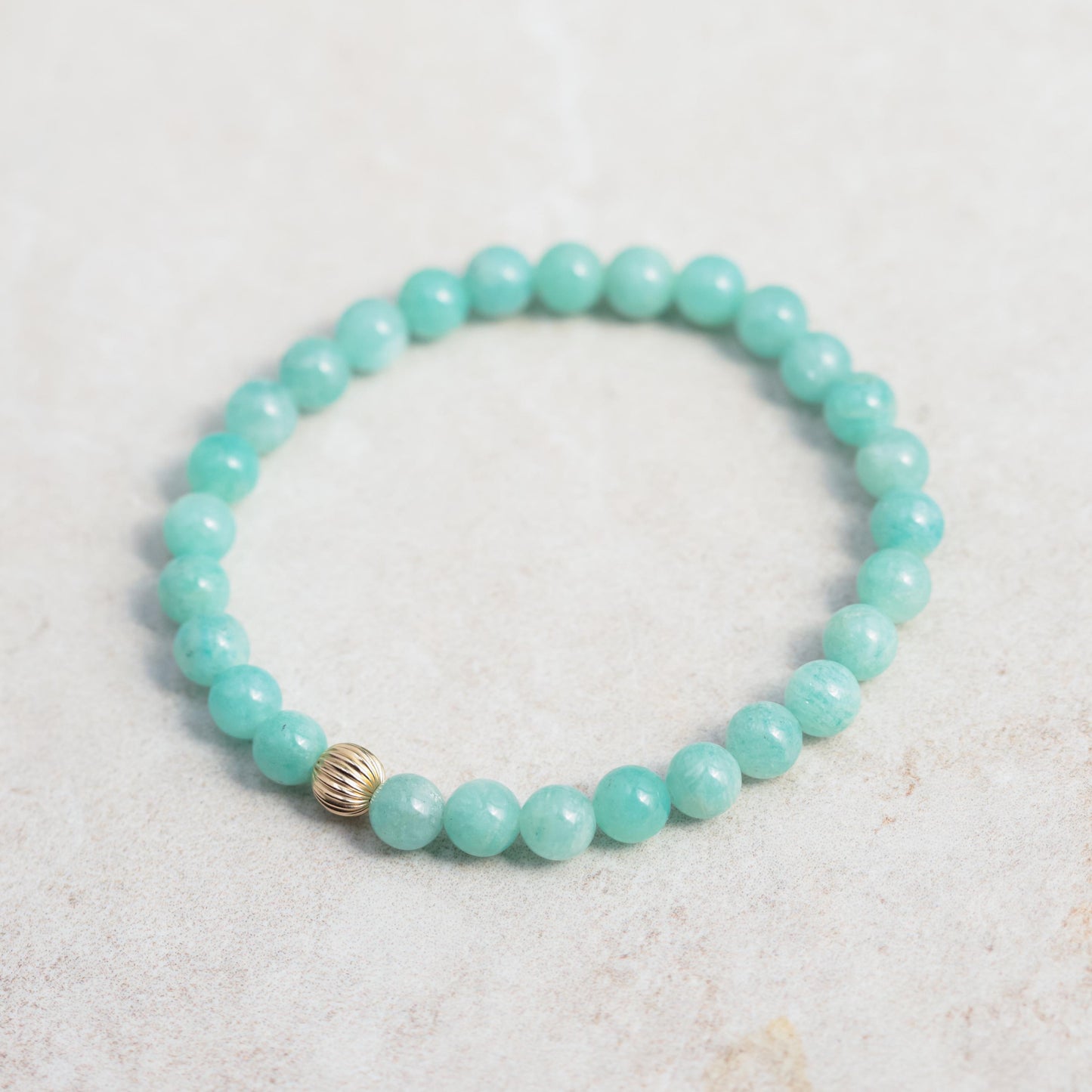 Brazilian Amazonite bracelet with 6mm beads from Earthly Abundance, featuring natural blue-green gemstone stones.