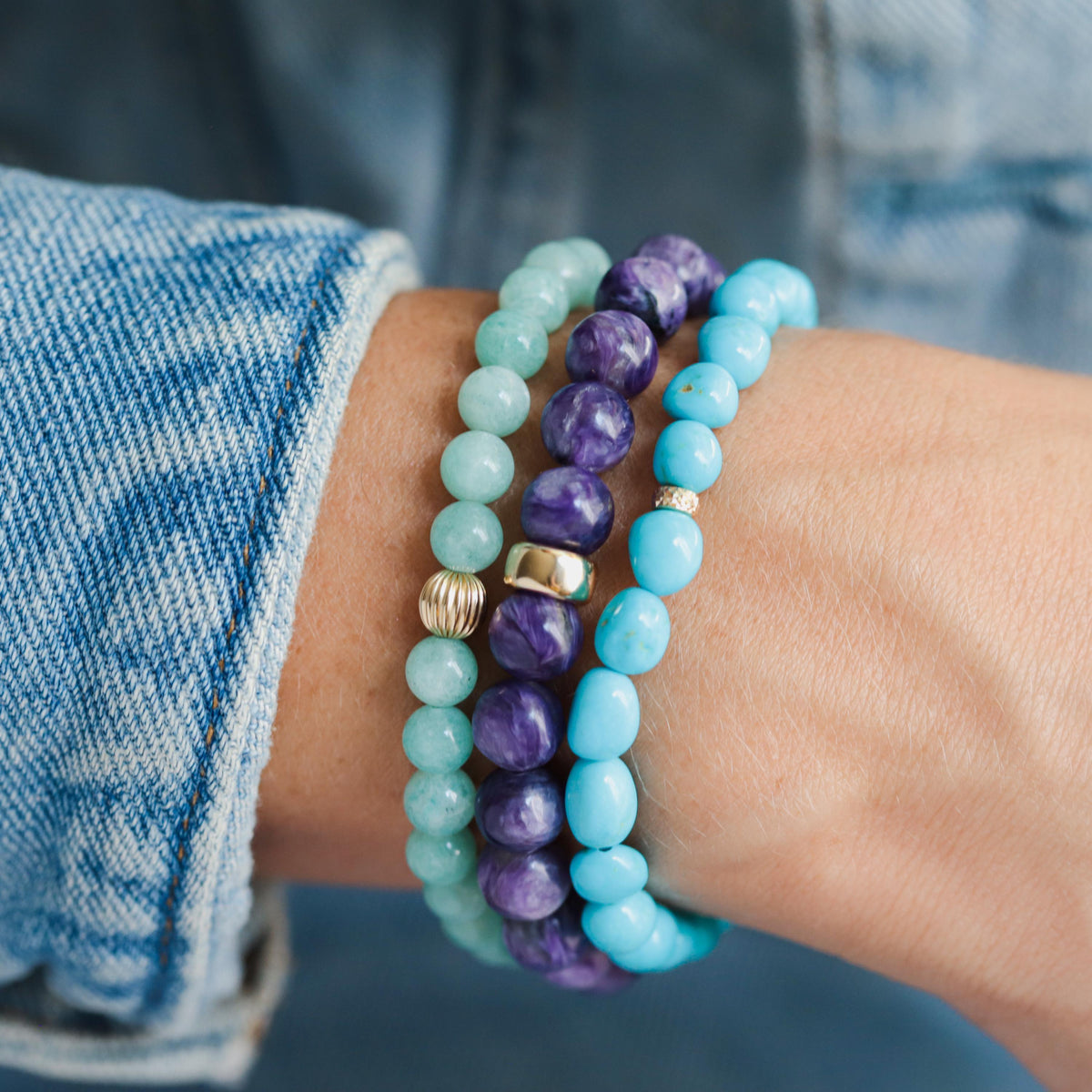 Brazilian Amazonite bracelet with 6mm beads from Earthly Abundance, showing the vibrant blue-green stones on a neutral background.