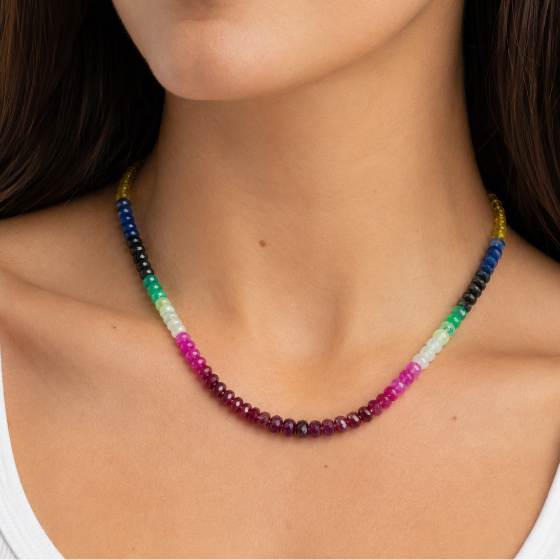 Rare Beauty multi-sapphire necklace featuring vibrant blue and green sapphires set in a delicate silver chain.