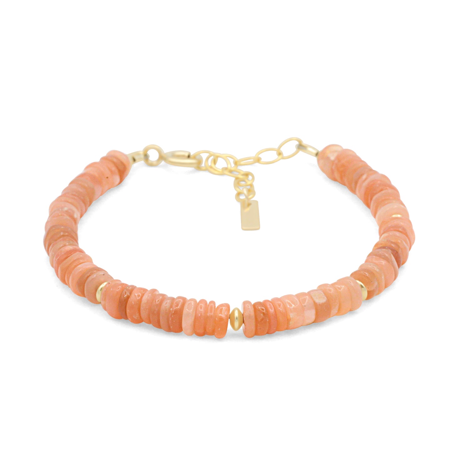 Peachy Glow Moonstone bracelet by Earthly Abundance featuring smooth, peach-colored moonstone beads on a delicate elastic band.