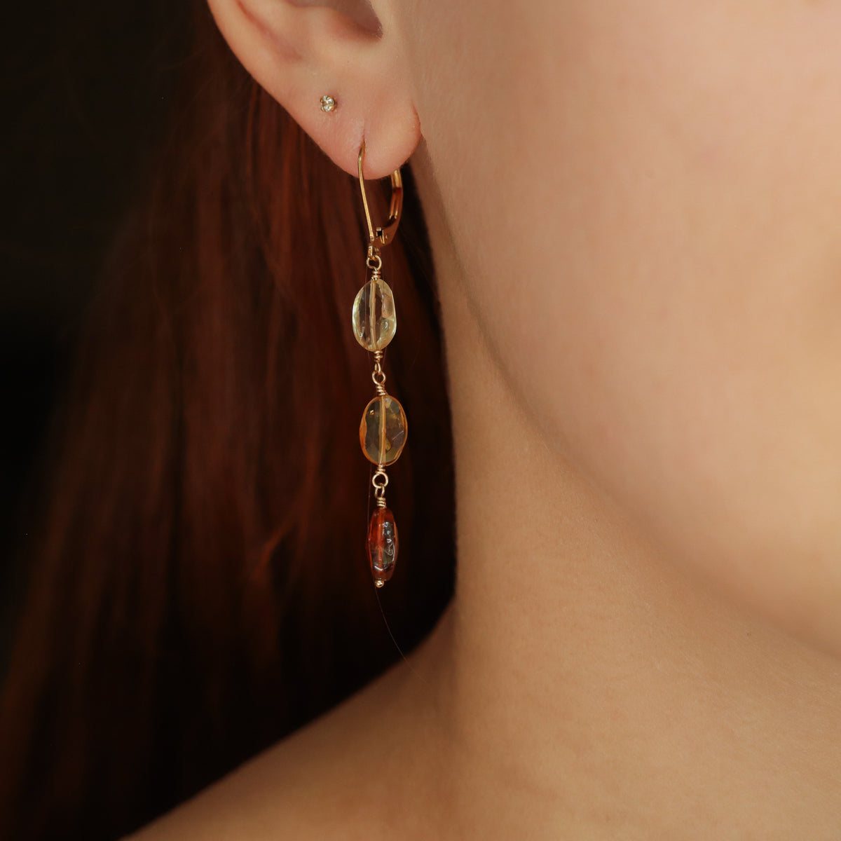 Citrine drop earrings with 14K gold-filled setting, featuring vibrant yellow gemstones, styled with elegant gold hooks.