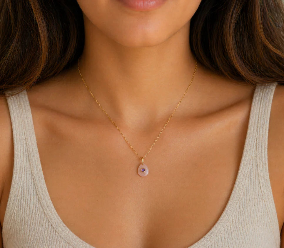Dawn Muse Pendant by Earthly Abundance featuring peach moonstone and amethyst gemstones on a silver chain.
