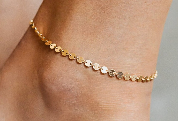 Gold-filled sequins chain anklet by Earthly Abundance featuring a delicate, shimmering design on a light background.