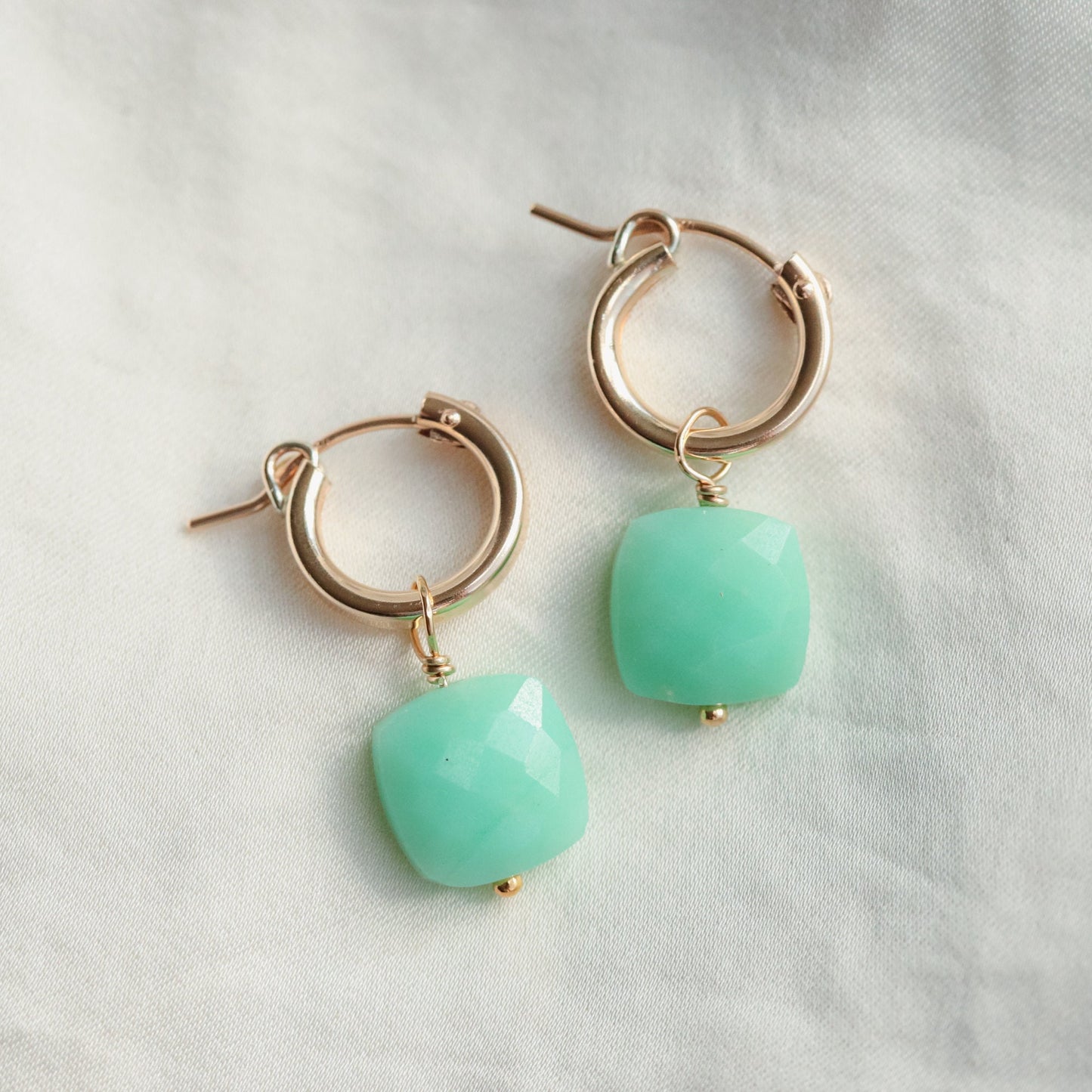 Chrysoprase square earrings by Earthly Abundance featuring vibrant green gemstone dangles on silver hooks.