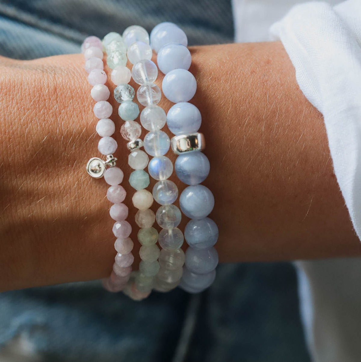 North Star Rainbow Moonstone bracelet with 14K gold accents, featuring smooth moonstone beads on a delicate gold chain.
