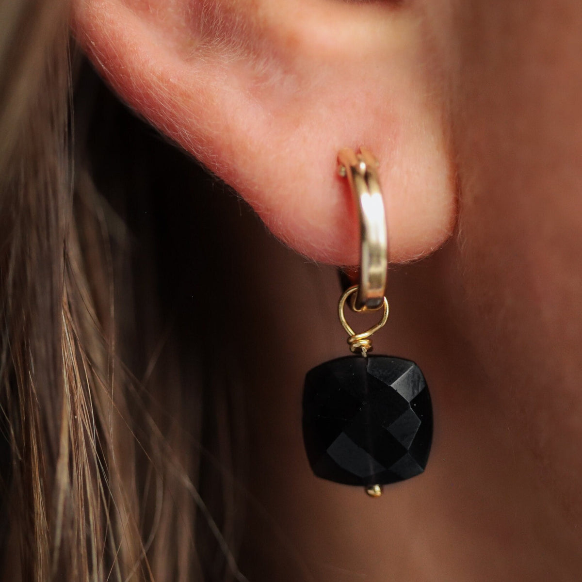 Tourmaline cushion earrings by Earthly Abundance Jewelry featuring vibrant, faceted pink and green gemstone dangles.