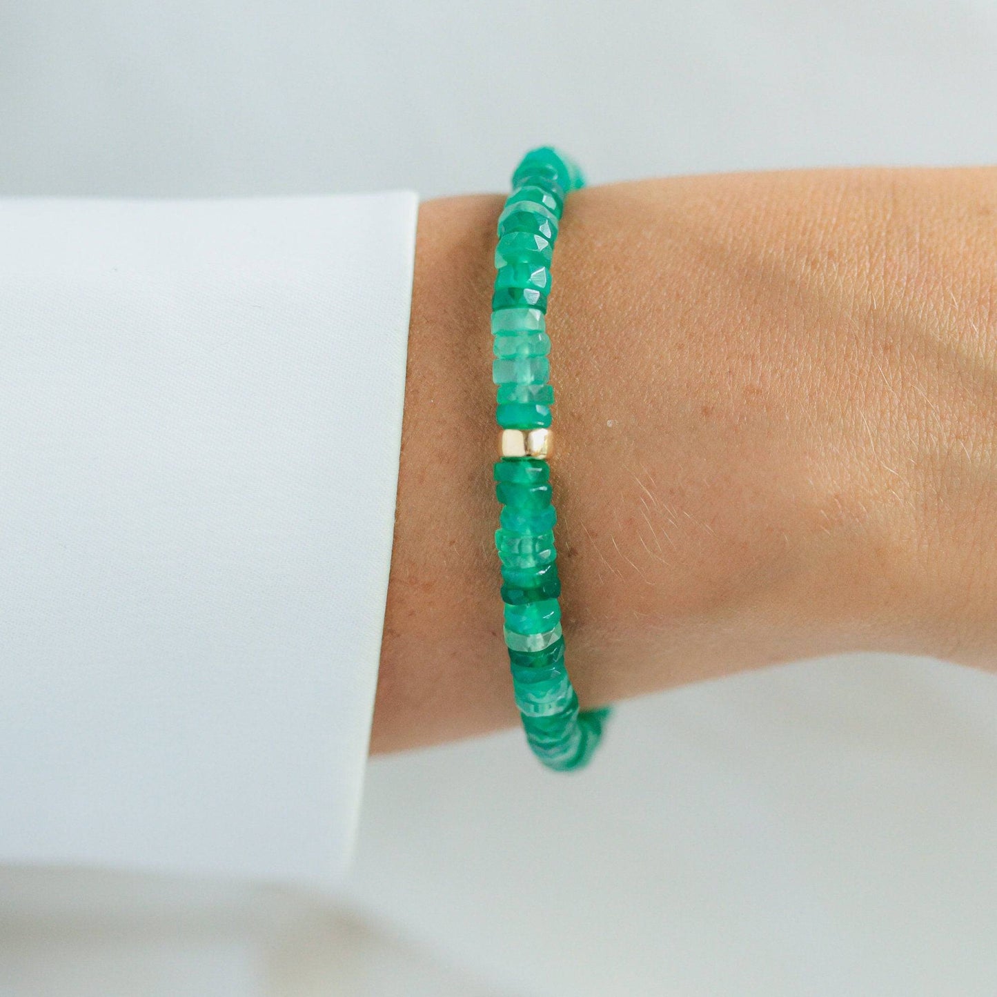 Green onyx heishi bracelet by Earthly Abundance featuring small, round green onyx beads strung together in a stylish design.