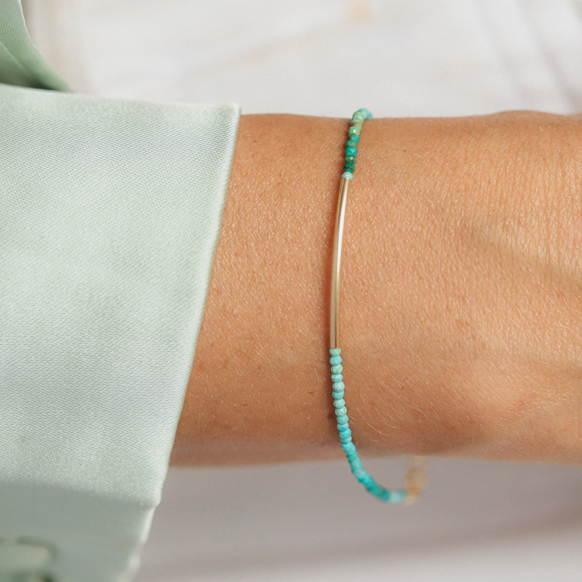 Azure Line Turquoise Bracelet by Earthly Abundance Jewelry featuring vibrant turquoise beads and a sleek silver clasp.
