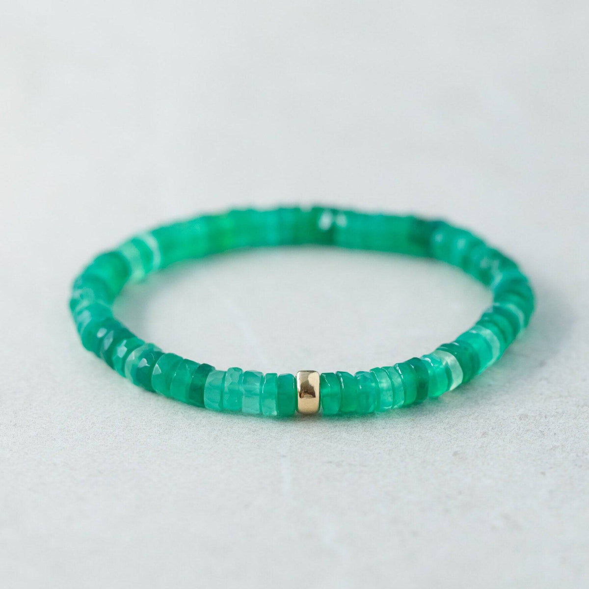 Green onyx heishi bracelet featuring small, round green onyx beads from Earthly Abundance, designed for stylish wrist wear.