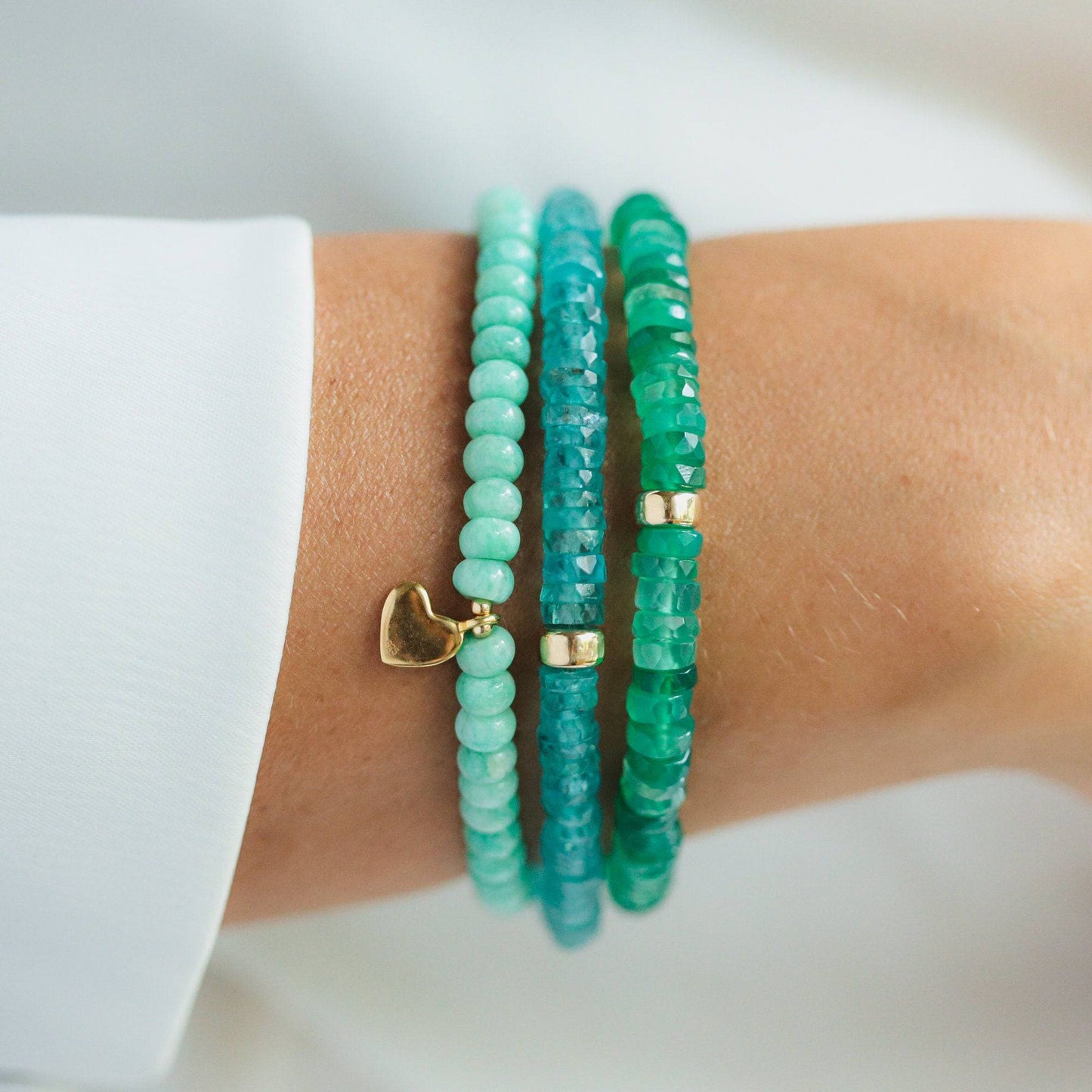 Green onyx heishi bracelet featuring small round green onyx beads strung together, created by Earthly Abundance.