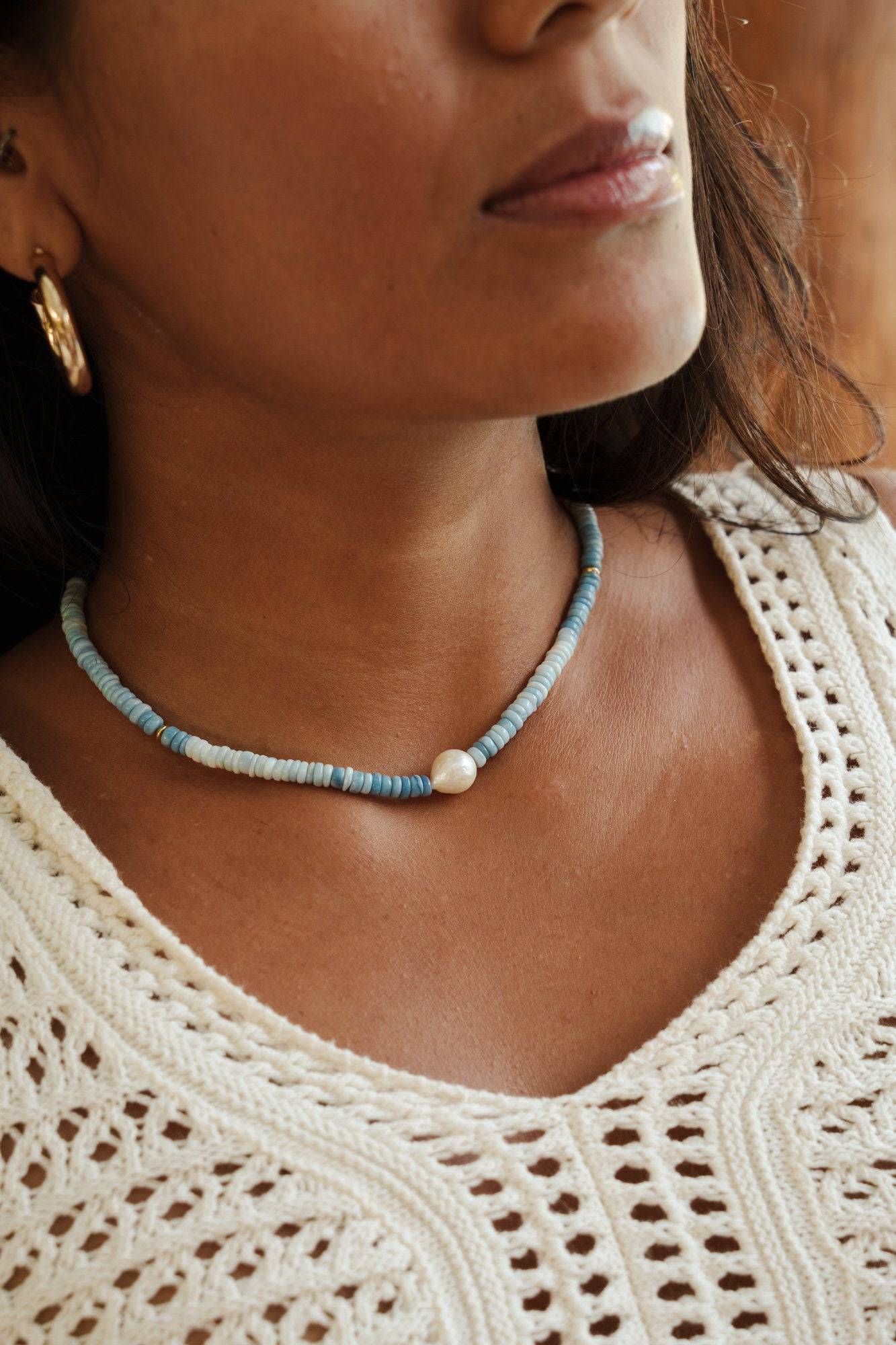 Peruvian Blue Opal necklace with 14K gold chain from Earthly Abundance, featuring vibrant blue opal gemstones.