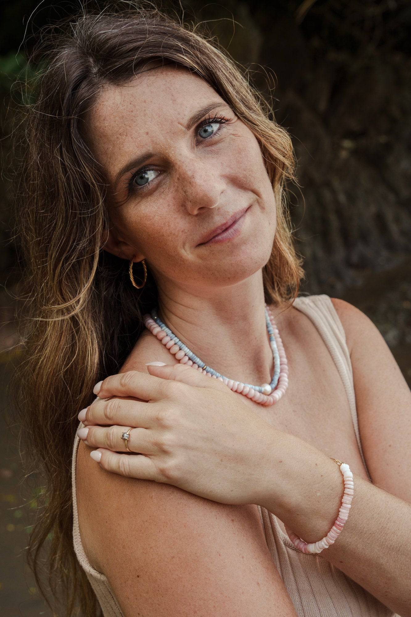 Peruvian Blue Opal necklace featuring a 14K gold chain, showcasing vibrant blue opal stones and elegant craftsmanship.
