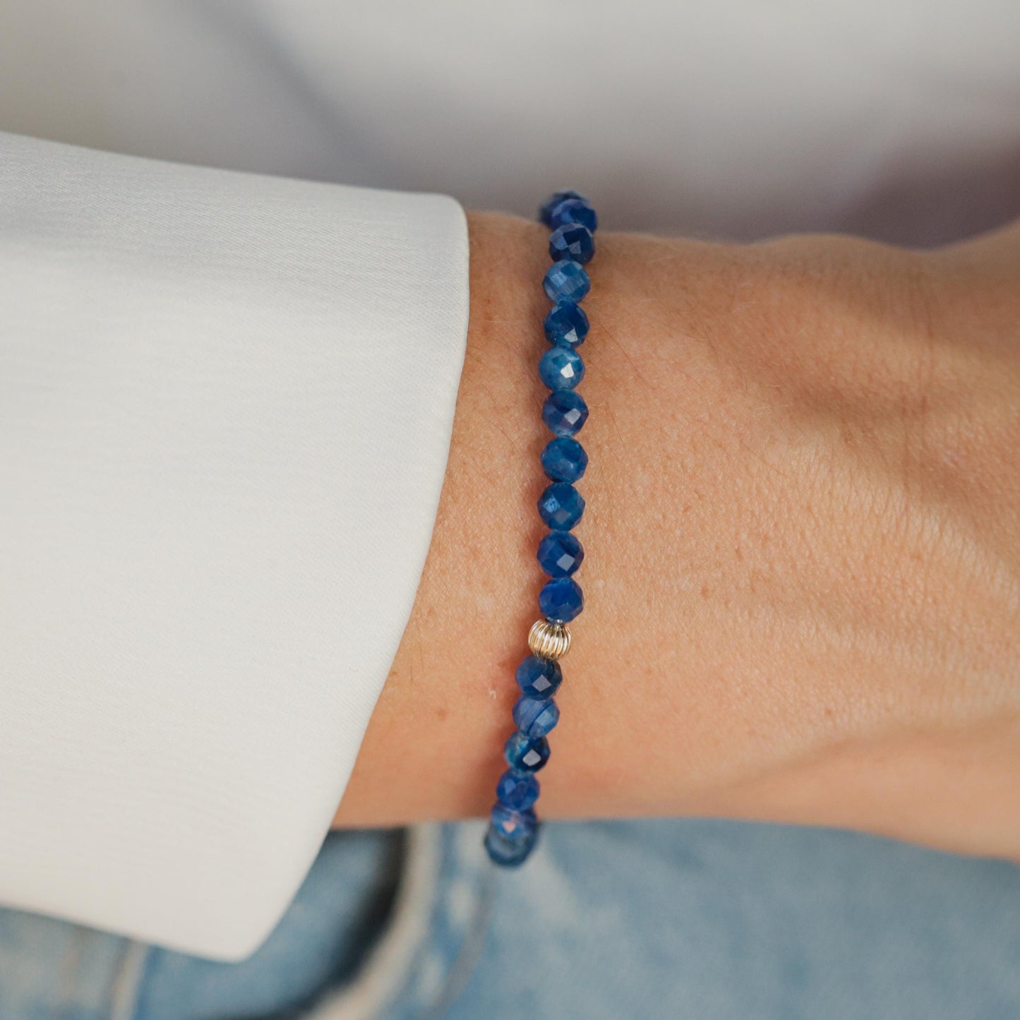 Spiritual Flow Kyanite bracelet with 14K gold accents from Earthly Abundance, featuring blue kyanite stones on a delicate bracelet.