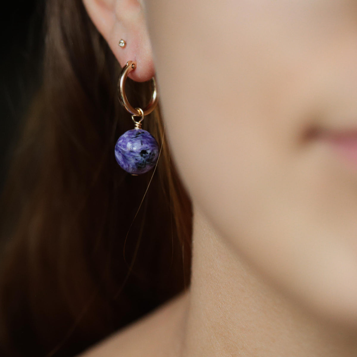 Charoite ball hoop earrings with 14K gold filled hoops, featuring vibrant purple gemstone spheres from Earthly Abundance.