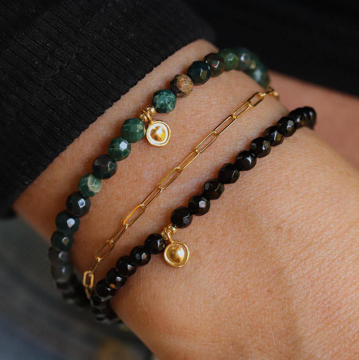 Bloodstone bracelet from Earthly Abundance Jewelry featuring polished beads, designed for protection and enhancing intuition.