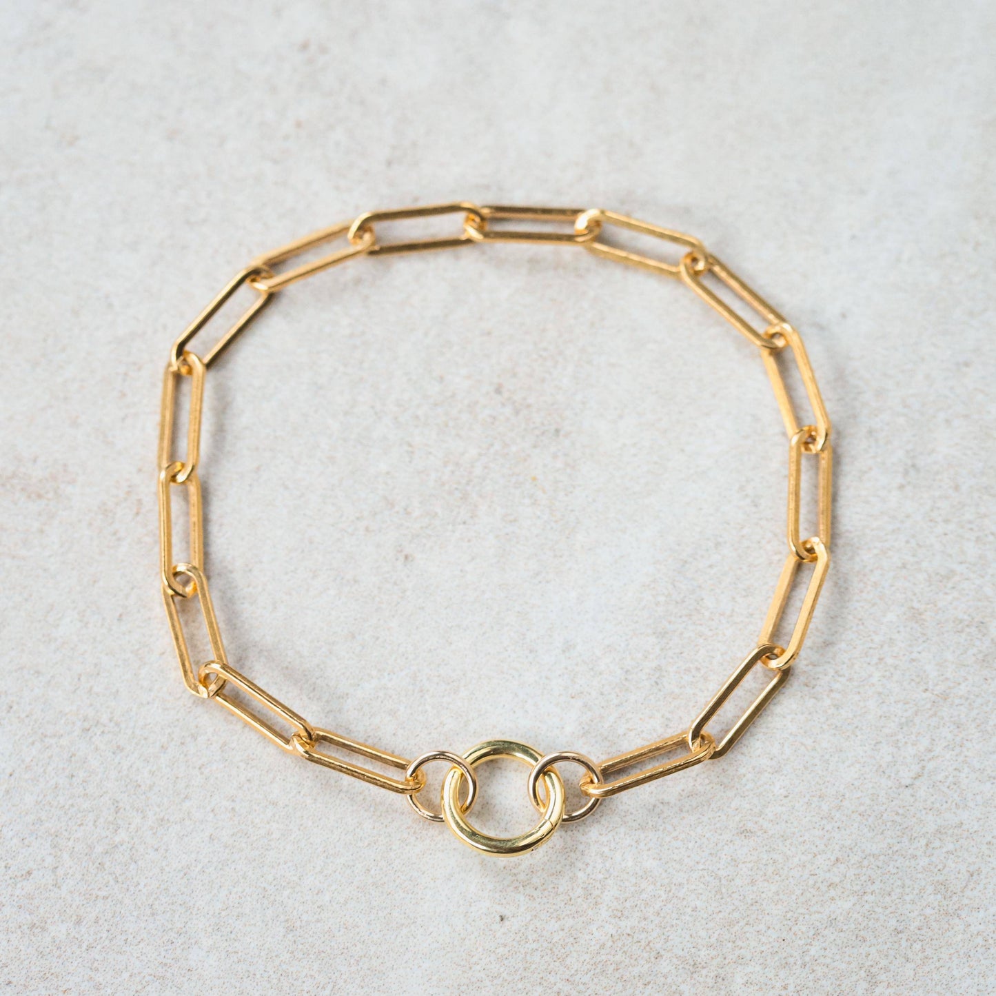 Paperclip carabiner bracelet by Earthly Abundance Jewelry featuring sleek metal links and a secure clasp design.