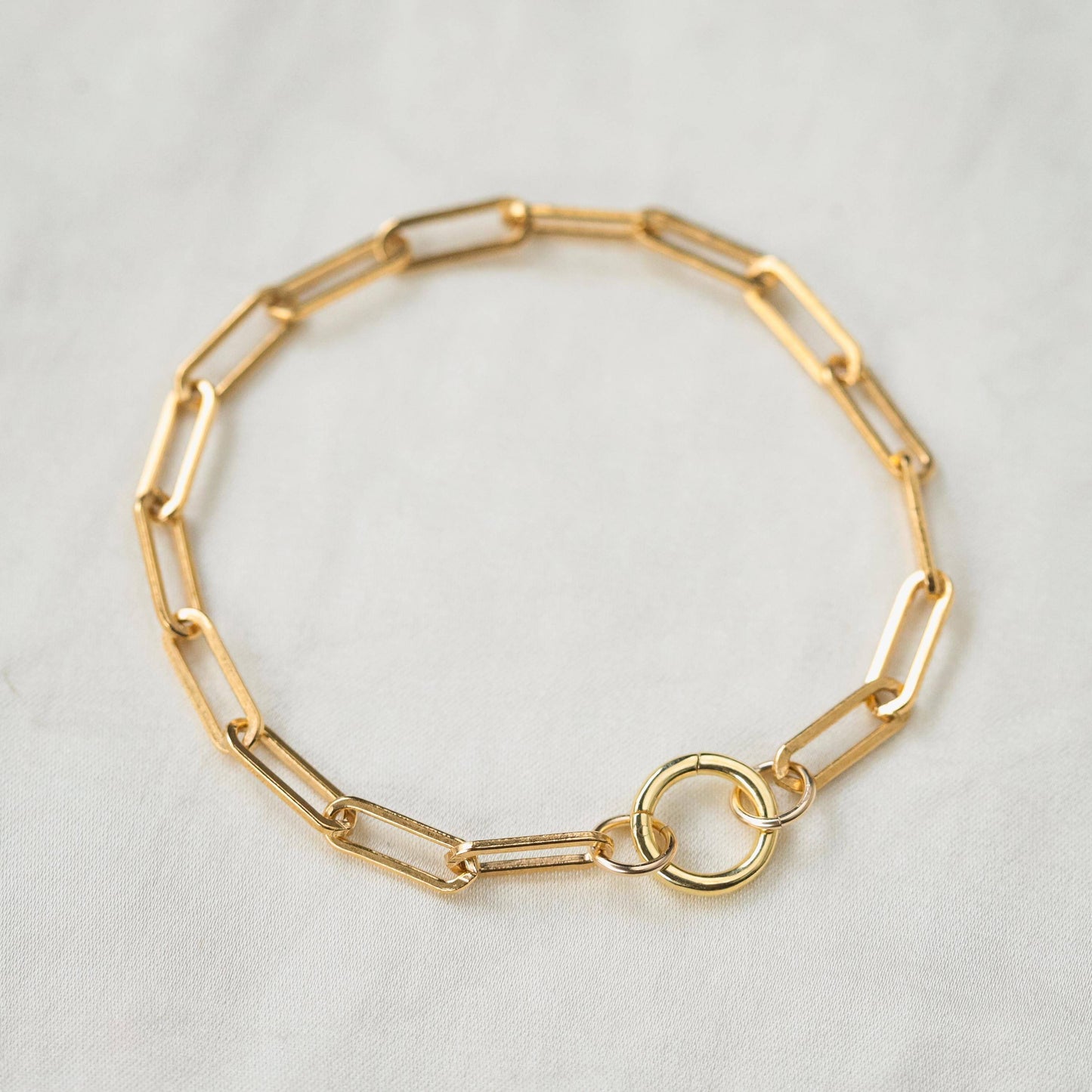 Earthly Abundance Jewelry paperclip carabiner bracelet featuring sleek metal links and secure clasp, stylish and durable jewelry accessory.