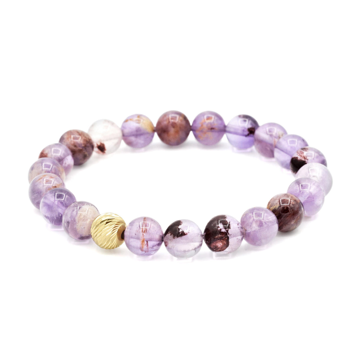 Cosmic Earth Auralite 23 bracelet by Earthly Abundance featuring vibrant, polished mineral beads on a stretch cord.