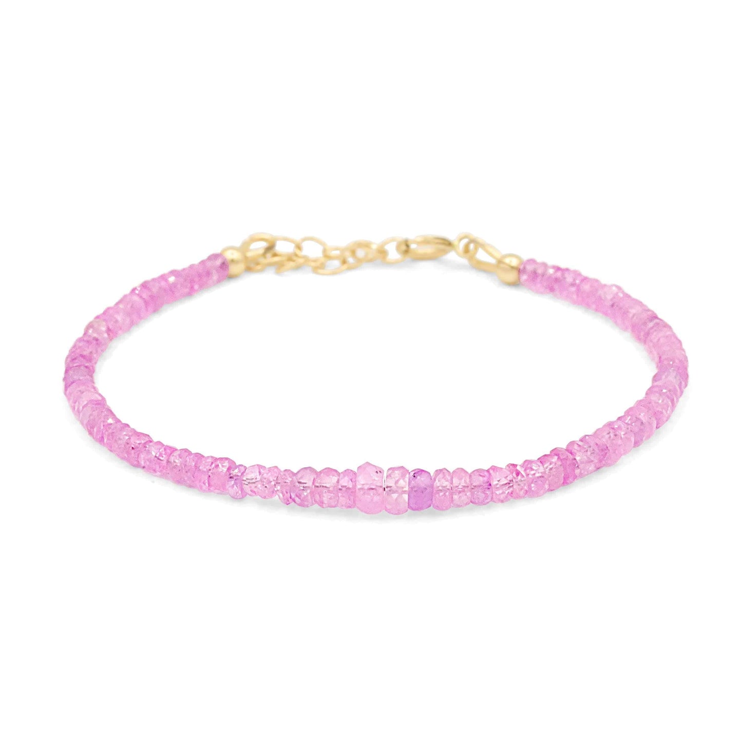 Baby pink sapphire bracelet in 14K gold featuring delicate pink sapphires, elegant jewelry piece from Earthly Abundance.