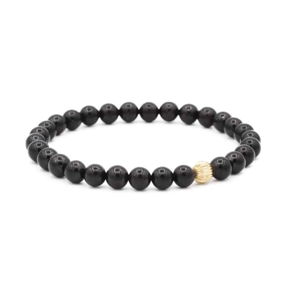 Shungite 6mm gemstone bead strand from Earthly Abundance Jewelry, showcasing round black stones with silver 14K accents.