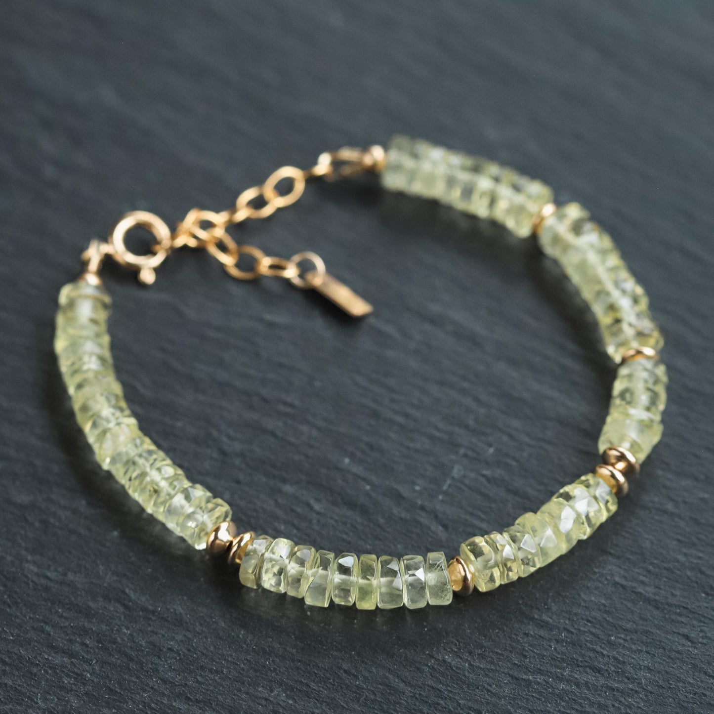 Natural Lemon Quartz bracelet by Earthly Abundance featuring yellow lemon quartz beads on an elastic stretch band.