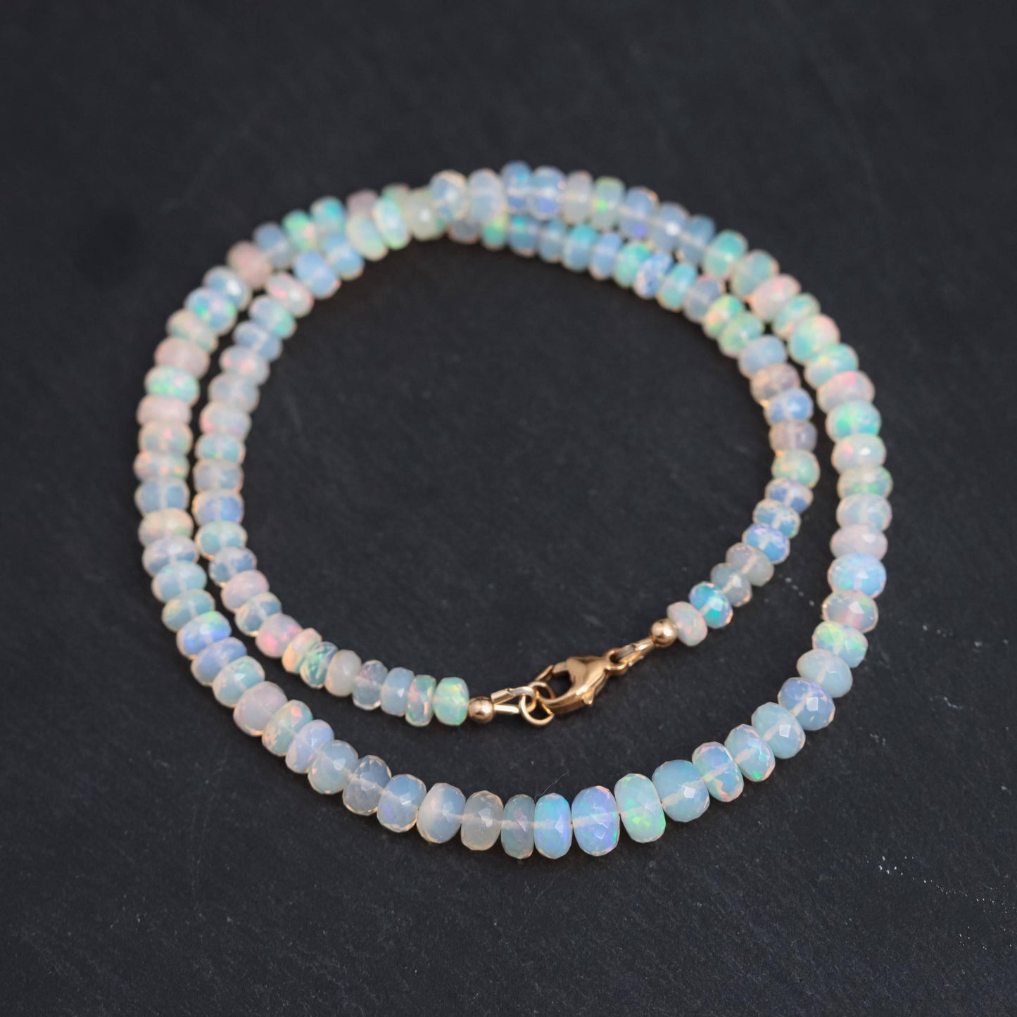 Ethiopian Opal beaded necklace with multicolored stones, handcrafted jewelry by Earthly Abundance, featuring vibrant gemstone beads.