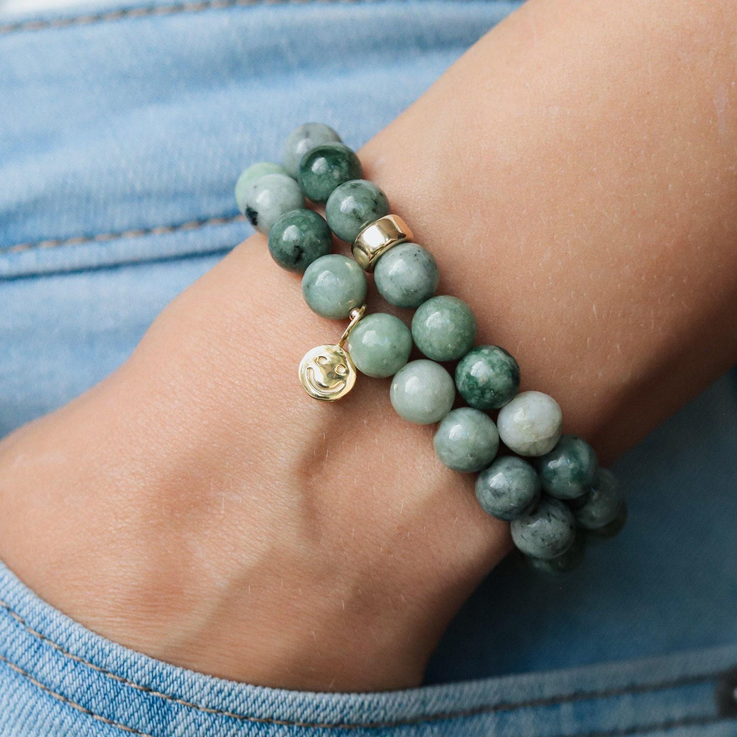 Burmese Jade 8mm gemstone beads from Earthly Abundance, showcasing smooth, polished green jade round beads on a string.